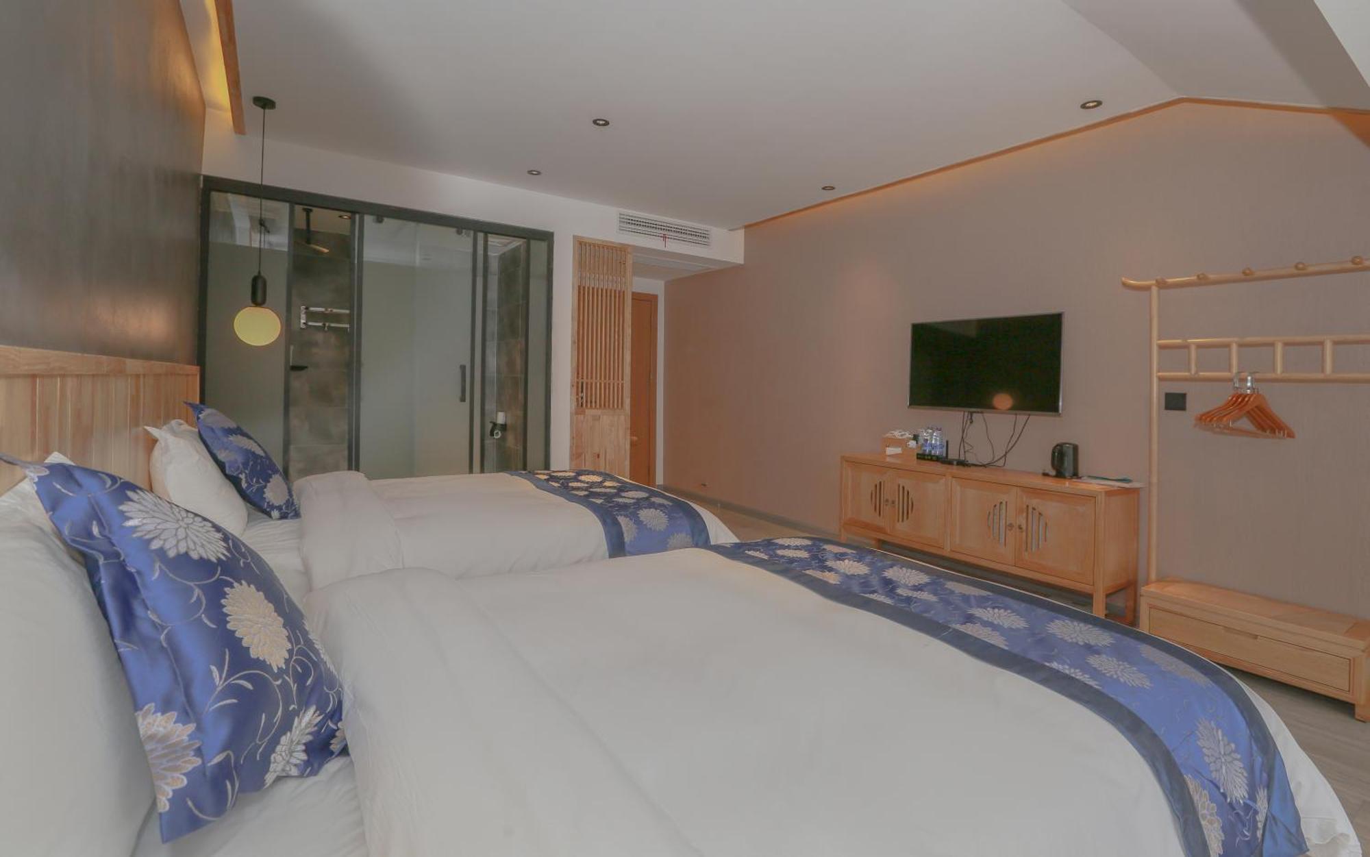 Cozy Boutique Hotel Zhangjiajie Buitenkant foto